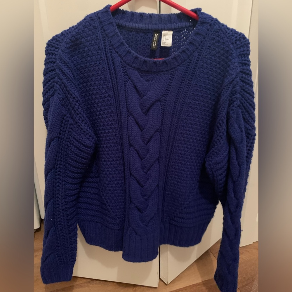 Blue knitted sweater